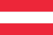 The flag of Austria which is a top destination for travelers in Europe