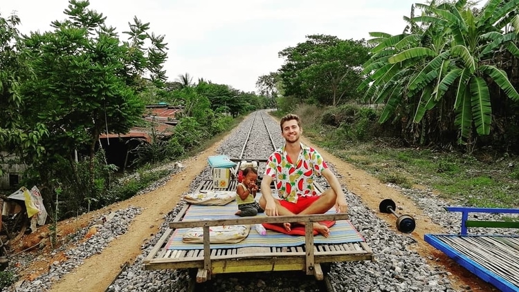 Sebastian from Travel Done Simple on the bamboo train in Battambang, Cambodia