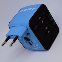 A universal international travel adapter set to adapt US chargers to European ones so a traveler can charge their devices while abroad